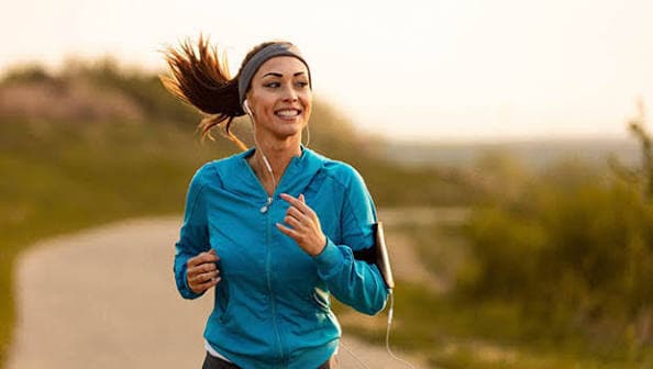 Active woman running outdoors representing the healthy lifestyle of Fleming Island patients at Health Pointe Jacksonville