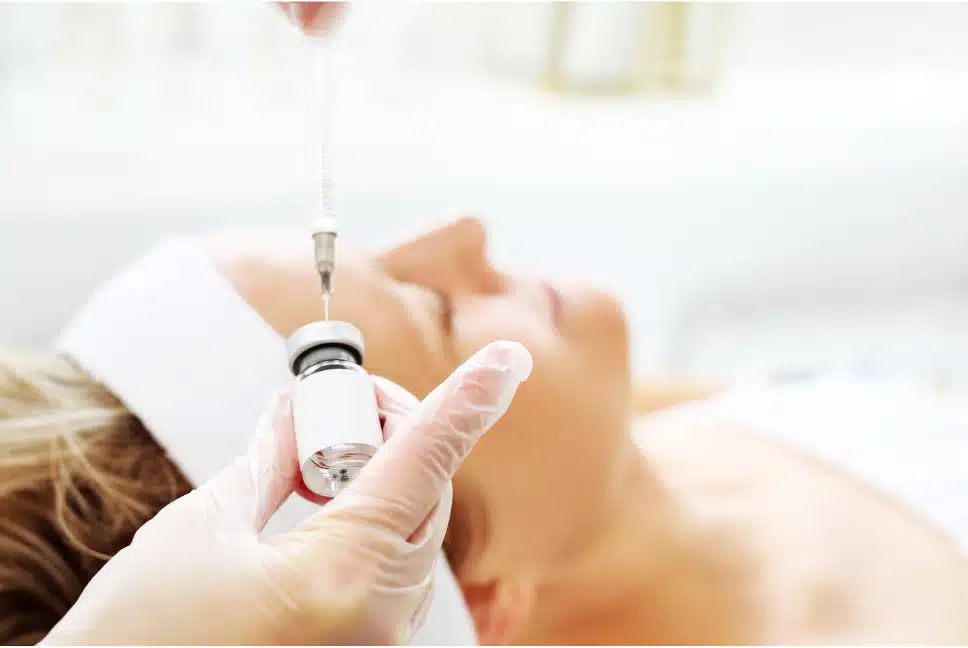 Practitioner preparing homeopathic injection for Acupuncture Point Injection Therapy at Health Pointe Jacksonville