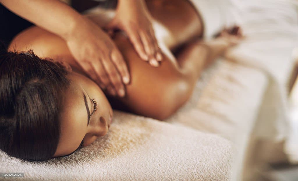 Licensed massage therapist performing therapeutic massage at Health Pointe Jacksonville