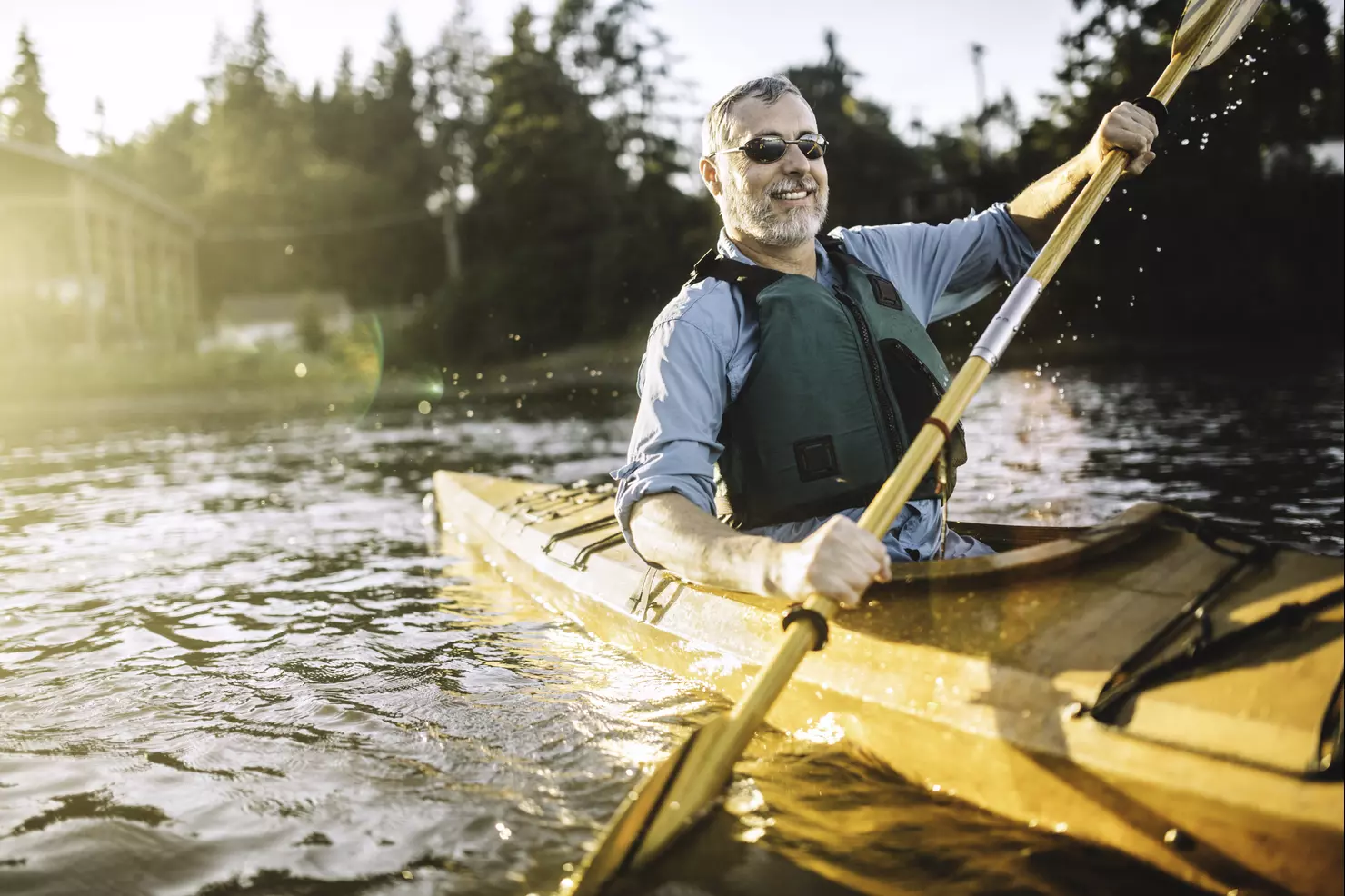 Man kayaking at sunset — active reproductive health supported by men's fertility acupuncture at Health Pointe Jacksonville