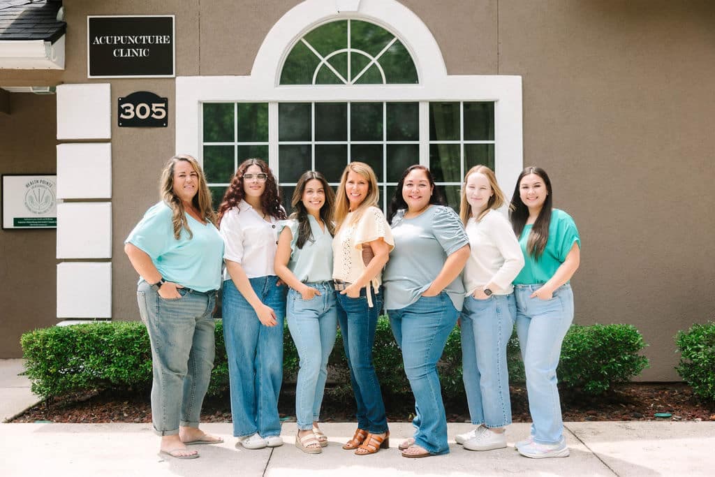 The Health Pointe Jacksonville acupuncture and wellness team outside their clinic at 3840 Belfort Rd, Jacksonville, FL