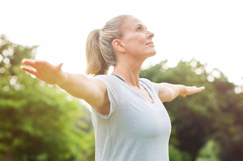 Woman embracing natural wellness and vitality through acupuncture care in Jacksonville FL